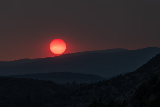 Wildfire enhanced sunset and cloudscape over Grass Valley in western Colorado on June 28, 2026.
