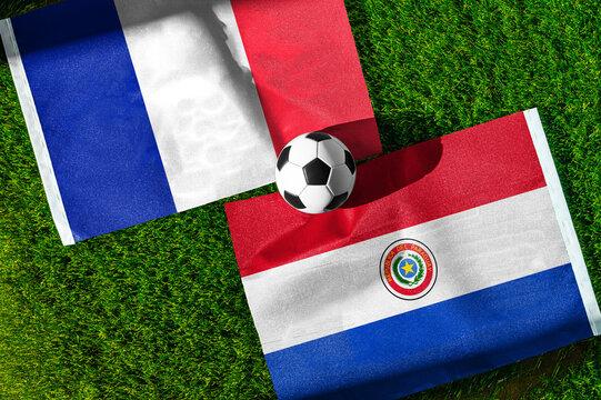 France vs Paraguay, national flags before international football tournament Round of 16 match, football on green grass with stadium in the background, Lincoln Field, Philadelphia, USA, July 4, 2026