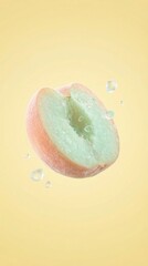 Fototapeta premium Half cut peach green flesh floats surrounded by crystal clear water droplets. Fresh minimalist aesthetic. Ideal for juice advertising health branding.