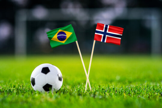 Brazil vs Norway, national flags before international football tournament Round of 16 match, football on green grass with stadium in the background, East Rutherford, New Jersey, USA, July 5, 2026