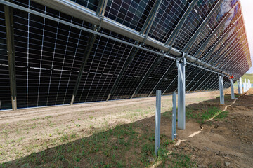 Ai Automatic sun tracking system for Solar panel support structure with metal beams and red mounting bracket © Parilov