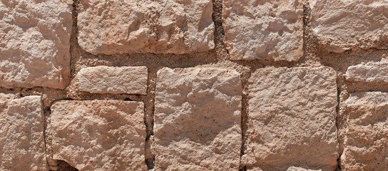 Rough ancient stone wall textured background surface © EdienuFoto