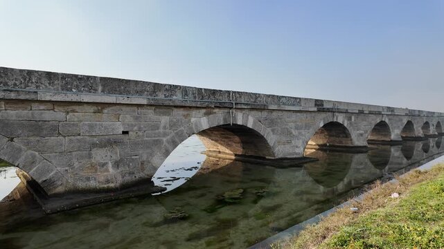 The Kanuni Sultan Suleyman Bridge, located in Silivri, Istanbul, Turkey, was built by Mimar Sinan in the 16th century. It is 333 meters long and has 32 arches.