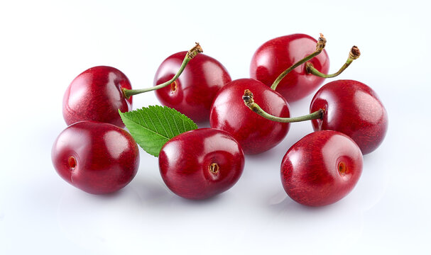 Cherry in closeup with leaf