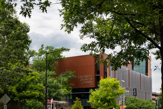 University Of The District Of Columbia Campus Building Framed By Green Trees In Washington DC