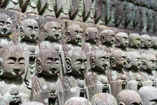 Stone Buddha statues in the Hase Temple, Kamakura, Japan. Hasedera religious temple