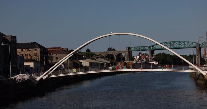 Drogheda, County Louth, Ireland - May 25, 2026:  A bridge crosses the River Boyne near the historic waterfront.