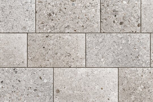Close-up of concrete blocks wall texture with speckled surface