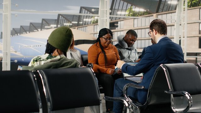 Shouting, flight delay and Angry african american man making annoyed phone calls in airport, making complaint calls, flight cancelation and frustrated traveler upset after losing plane.