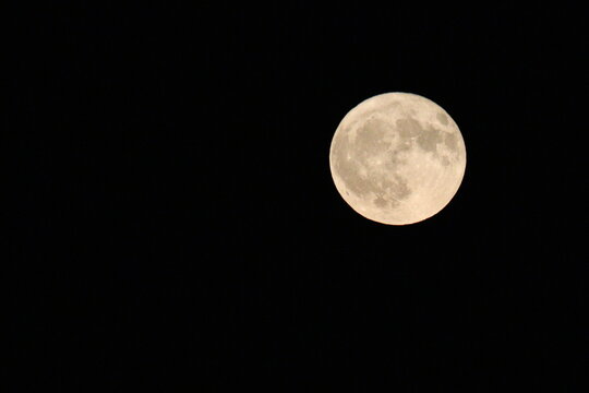 full moon over black