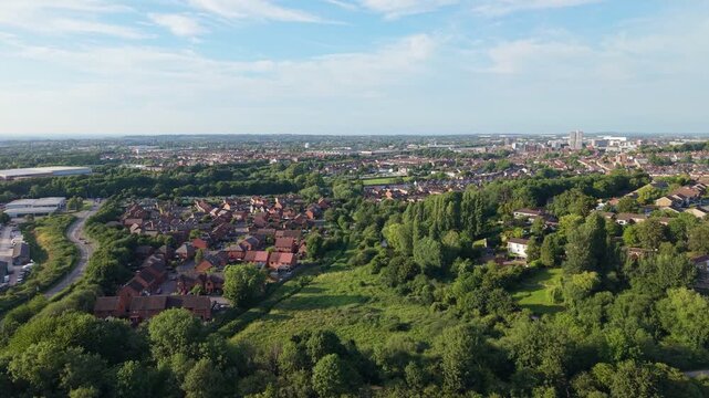 Aerial drone footage of the Okus area, the restored Swindon Canal corridor, and Old Town in Swindon, Wiltshire, England, featuring residential neighbourhoods