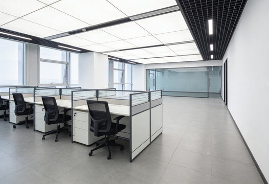 office interior with empty cubicles, workstations, chairs, desks, glass partition wall. Workplace, commercial space, corporate room, business floor.