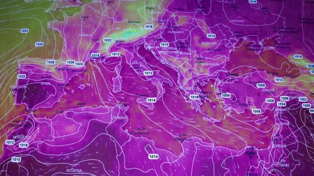 Heat wave over Europe colorful weather data screen showing pressure lines, wind flow and atmospheric systems Europe Mediterranean Balkans North Africa filmed from computer display visible pixels.
