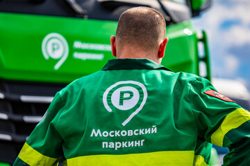 Fototapeta premium Moscow Parking Service employee at a special vehicle on Moscow Street