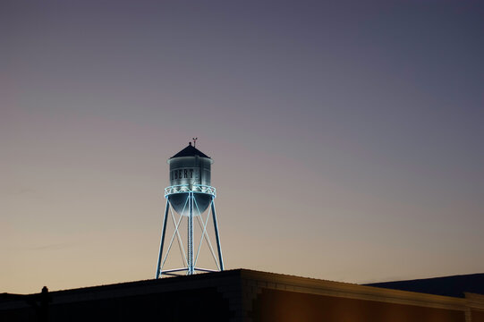Vintage water tower at night in Gilbert Arizona