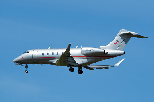 VistaJet Bombardier Challenger 350 (9H-VCV) business jet on final approach for landing at Narita International Airport