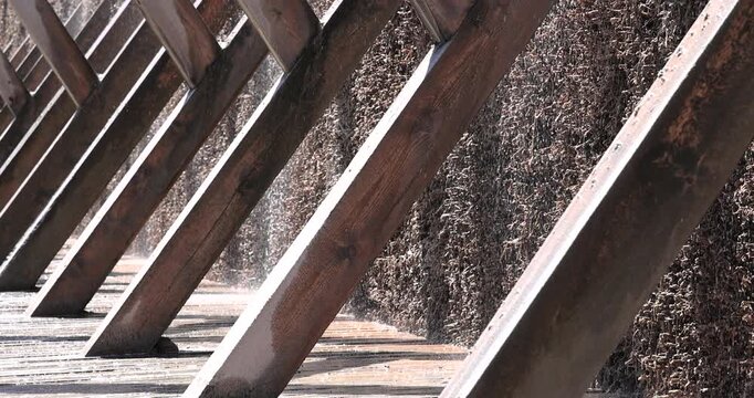 Poland Ciechocinek evaporation salt Graduation Tower close. Brine structure, built 1824. Healing power of salt minerals. Distills evaporates saltwater. Historical. Historic wooden structure. Industry.