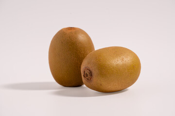 Fototapeta premium Group of kiwi fruits isolated. Two kiwi fruits isolated on white background.