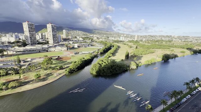 Outrigger boat or Canoe is a watercraft. The Ala Wai Canal is an artificial waterway in Honolulu, Oahu, Hawaii which serves as the northern boundary of the tourist district of Waikiki.