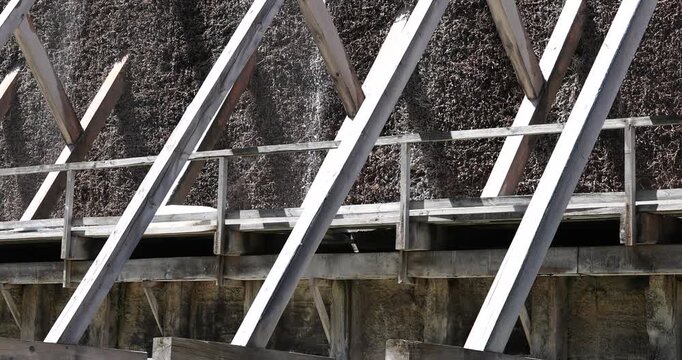 Poland Ciechocinek evaporation salt Graduation Tower. Brine structure, built 1824. Healing power of salt minerals. Distills evaporates saltwater. Historical. Historic wooden structure. Industry.
