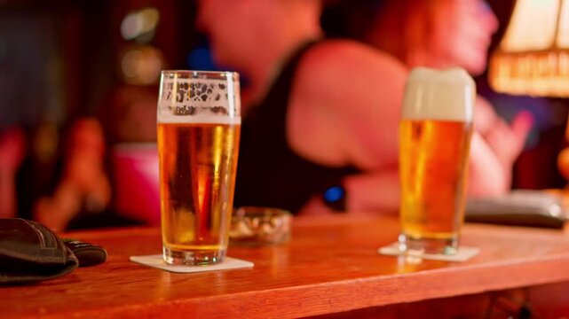 Large glass of beer being served at a traditional German pub