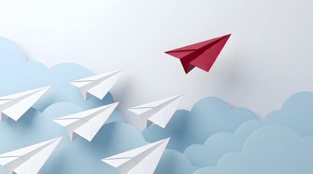Red paper plane breaking away from a group of white planes among blue clouds representing individuality and innovative business direction.