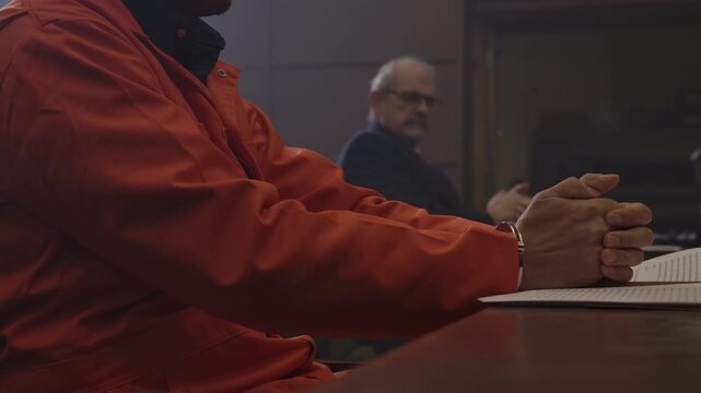 Nervous inmate hearing his judgement in trial american justice