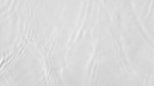 water waves cross each other creating ripples in slow motion.