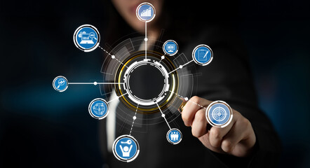 Fototapeta premium A professional hand reaches out to interact with digital icons representing business networking and technology advancements in a modern workspace setting. Crux