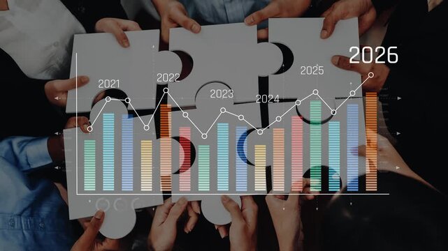 A diverse group of professionals collaborates on puzzle pieces while analyzing business growth data from 2021 to 2026, showcasing teamwork and strategic planning. Raster