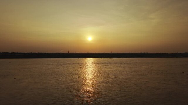 Forward Drone Flight Toward Sunset at the Padma River in Bangladesh.