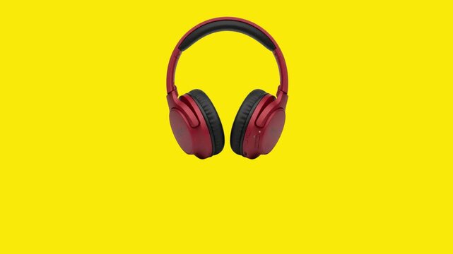 Animated modern red wireless headphones falling from the top on an isolated yellow background. Realistic 3D over-ear audio headset dropping down animation loop for tech product advertisement template 