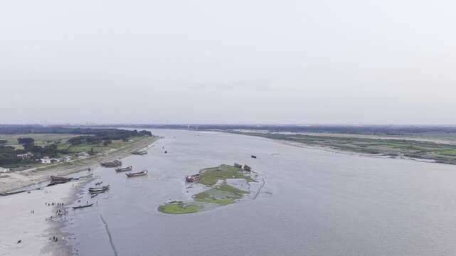 Drone Flying Over a Small River Island on the Padma River in Bangladesh