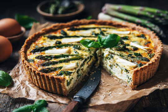 Asparagus Tart with Creamy Filling and Fresh Herbs. AI generative.