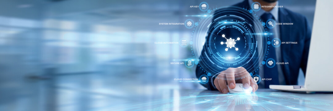 Businessman using a laptop for API data analysis, monitoring software integration performance, tracking application data transfer rates, and optimizing backend developer metrics.