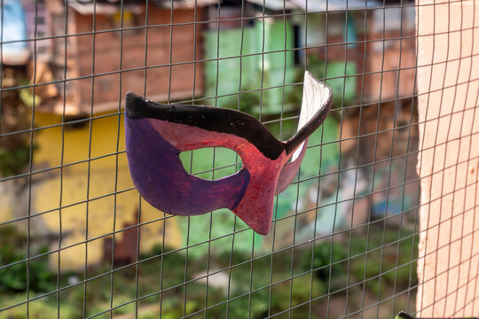 Carnival masks tied to ram wire in Malang's colorful village
