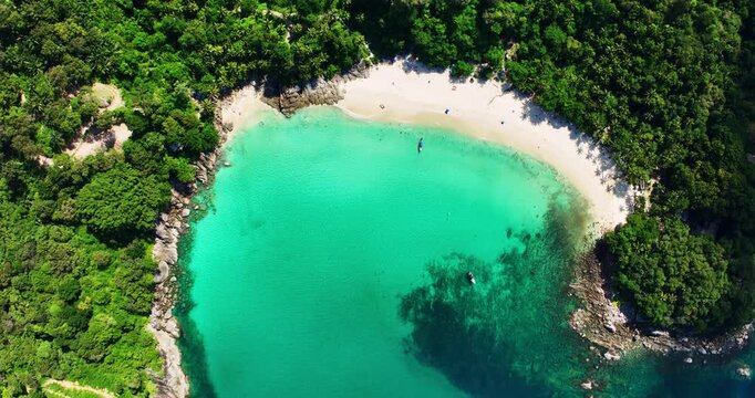 Aerial view Drone camera of seashore rocks in summer season, Beautiful freedom beach in Phuket Thailand, Amazing sea waves crashing on rocks seascape in Phuket island Thailand