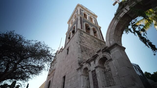 Discover the Loreto Mission during sunset in Baja California Sur, Mexico showcasing the beauty of this historic site in the desert oasis