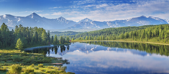Fototapeta premium Mountain scenery, snow-capped mountain peaks, sunny morning, summer travels