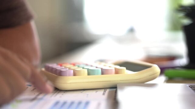 Man Using Calculator for Financial Planning, Accounting Work, Business Calculation, Office Management and Money Budgeting Concept
