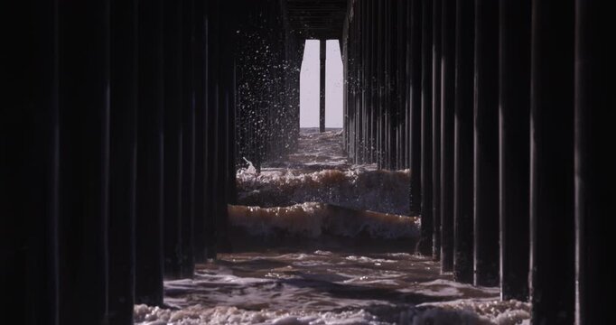 Super Slow Motion Ocean Waves Beneath Pismo Beach Pier | Tunnel View of the Pacific Ocean