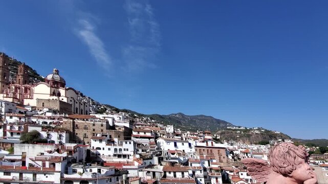 View of Santa Prisca Church and the historic hillside town of Taxco, Guerrero, Mexico.