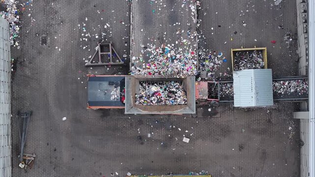 Plastic waste enters the recycling facility