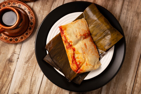 Oaxacan tamales. Typical dish from Mexico and Latin American countries. Usually served for breakfast or dinner. Corn dough wrapped in banana leaves and filled with meat or stew. Steam cook.