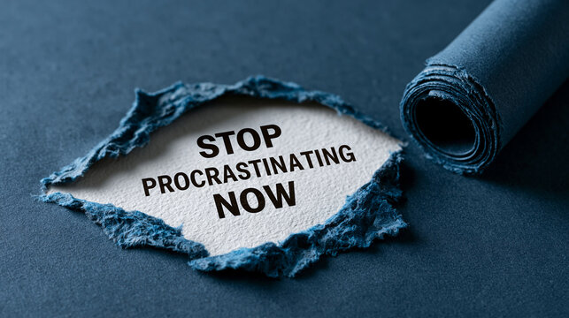 Stop Procrastinating Now: A torn piece of paper with the urgent message STOP PROCRASTINATING NOW is revealed against a textured blue background.