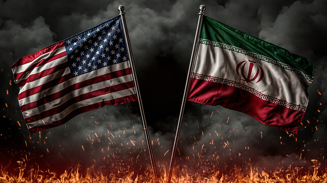 US and Iran Flags in Dramatic Atmosphere: The American and Iranian flags fly prominently against a backdrop of smoke, fire, and an ominous sky, symbolizing geopolitical tension and conflict.