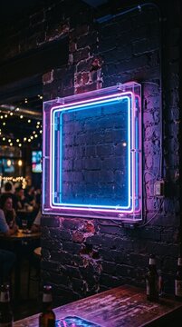 Neon square light frame on dark brick wall in bar