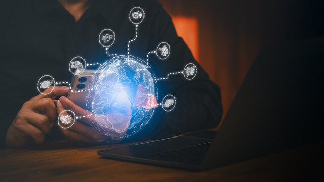 Man using smartphone with AI globe hologram. Global network, artificial intelligence, digital business technology, smart communication and future machine learning concept.