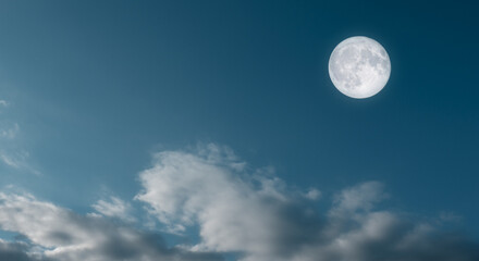 Fototapeta premium Dramatic Dark Sky with Bright Full Moon at Dusk Time
