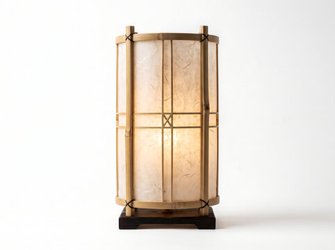 Close-up studio photograph of a tranquil Japanese Andon paper lantern lamp with natural bamboo frame and rice paper panels
